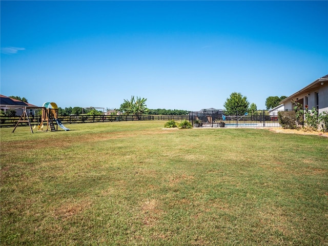 view of yard featuring a playground