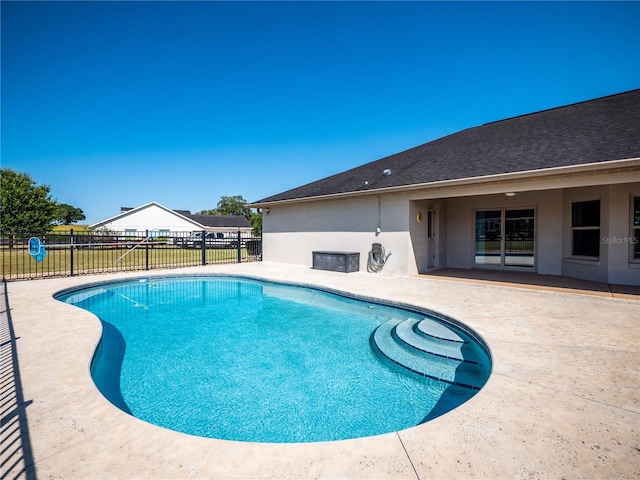 view of pool featuring a patio area