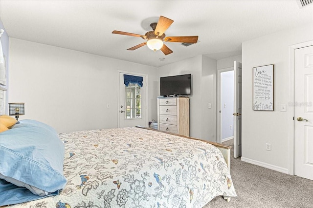 bedroom with ceiling fan and carpet floors