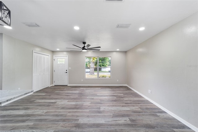 interior space featuring light wood-type flooring and ceiling fan