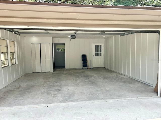 garage featuring a garage door opener