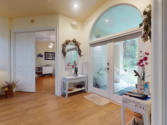 entryway featuring ceiling fan and light hardwood / wood-style flooring