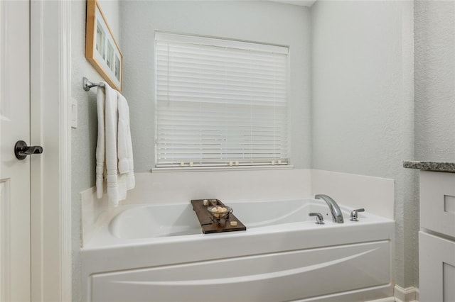 bathroom with a bathing tub