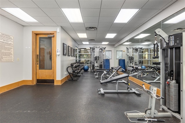 gym with a drop ceiling