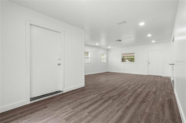 empty room featuring dark hardwood / wood-style floors