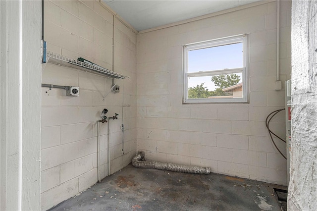 washroom with hookup for an electric dryer