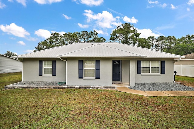 ranch-style house with a front lawn