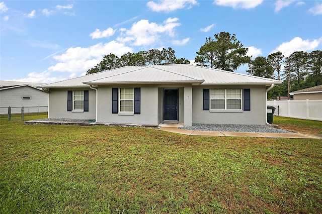 ranch-style house with a front lawn