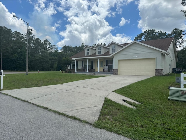 view of front of property featuring a garage, a front yard, and central AC unit