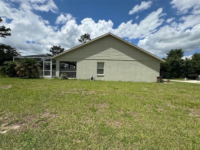 view of home's exterior featuring a lawn