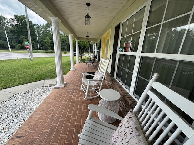 view of terrace featuring covered porch