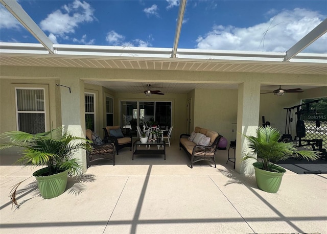 view of terrace featuring ceiling fan, a lanai, and an outdoor hangout area