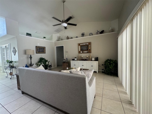 living room featuring high vaulted ceiling, ceiling fan, and light tile floors