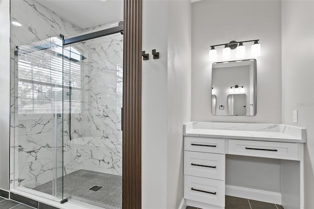 bathroom with vanity, tile patterned floors, and walk in shower