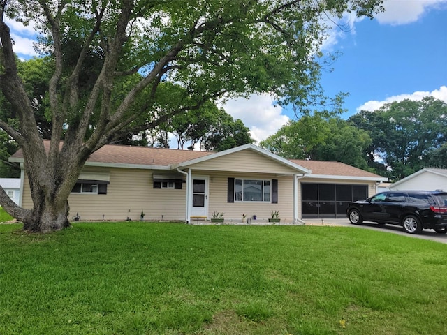 ranch-style house with a front yard