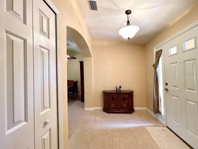 view of tiled foyer entrance