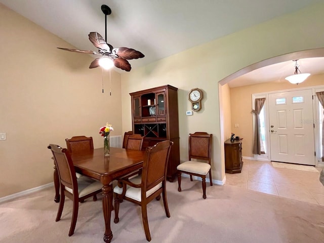 dining room with light tile patterned flooring and ceiling fan