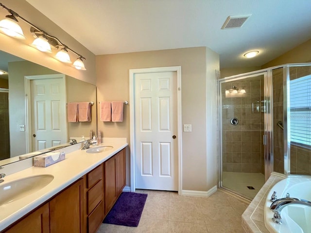 bathroom with shower with separate bathtub, tile patterned flooring, and dual vanity