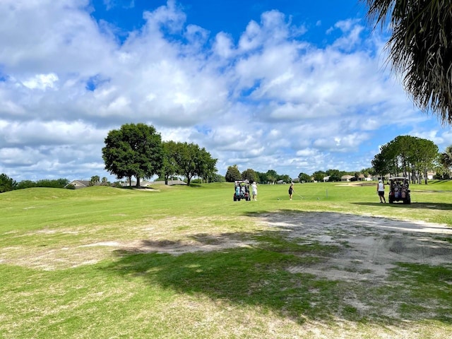 surrounding community featuring a yard