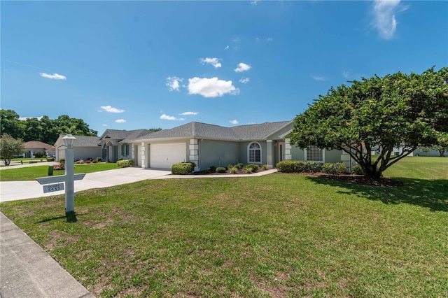 single story home with a garage and a front yard