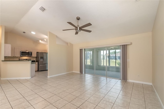 unfurnished living room featuring high vaulted ceiling, ceiling fan, and light tile flooring