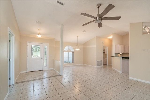 tiled entryway with ceiling fan