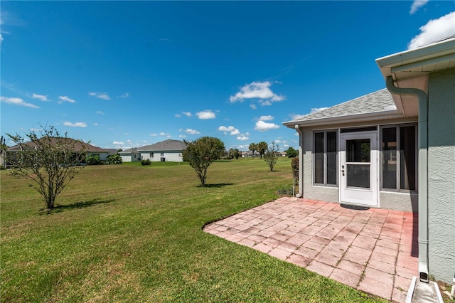 view of yard with a patio area