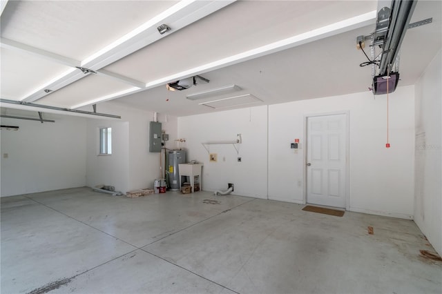 garage with a garage door opener and water heater