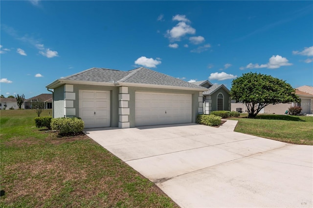 ranch-style home featuring a garage and a front yard