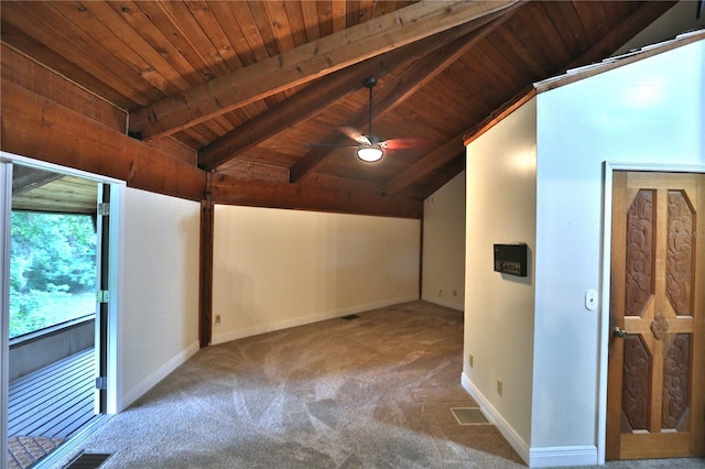 interior space featuring carpet flooring, lofted ceiling with beams, ceiling fan, and wood ceiling