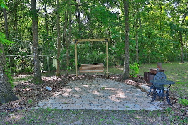 view of yard with a playground and a patio area