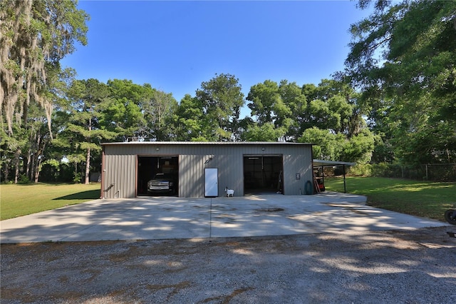 garage with a lawn