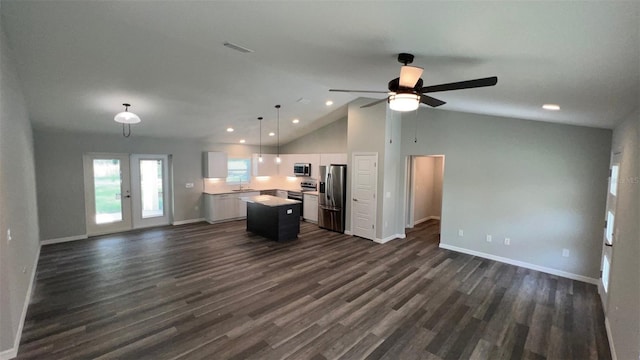 unfurnished living room featuring french doors, dark hardwood / wood-style floors, high vaulted ceiling, sink, and ceiling fan