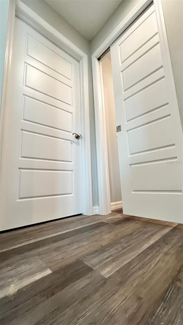 interior space with dark hardwood / wood-style floors