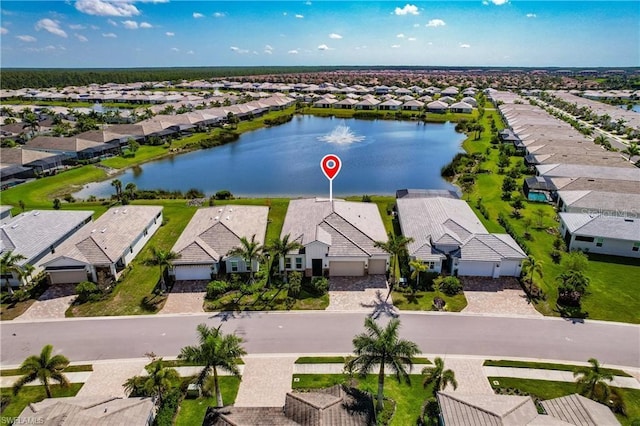 bird's eye view with a water view