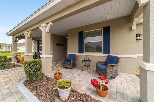 view of patio featuring covered porch