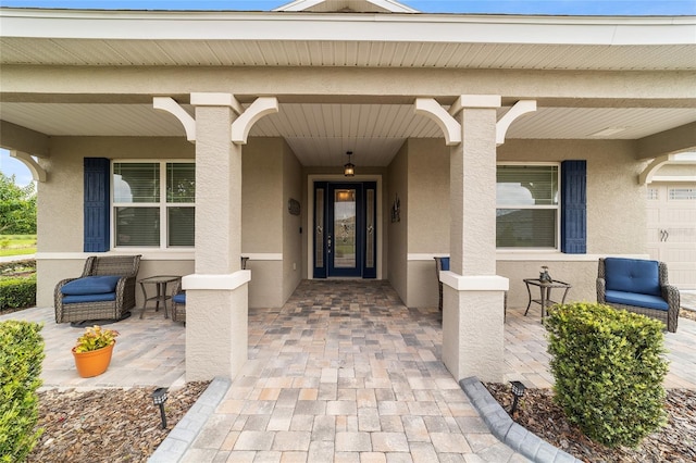 property entrance featuring covered porch