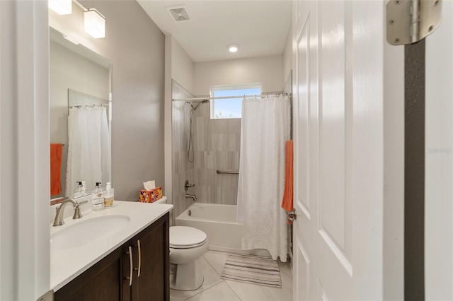 full bathroom featuring tile patterned flooring, shower / bath combination with curtain, toilet, and vanity