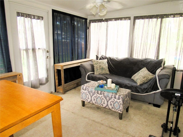 living room with a ceiling fan