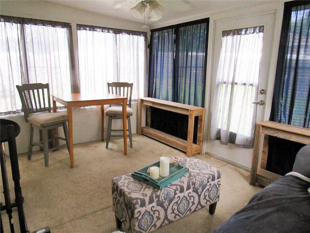 dining area with a healthy amount of sunlight and a ceiling fan