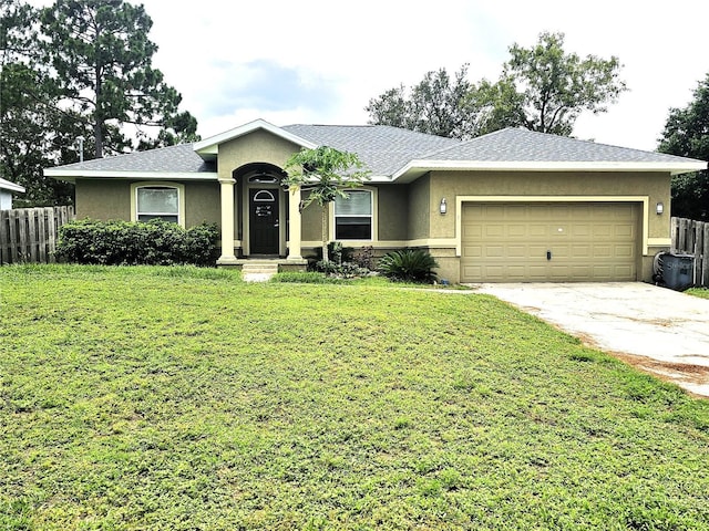 ranch-style house with driveway, a garage, fence, a front lawn, and stucco siding