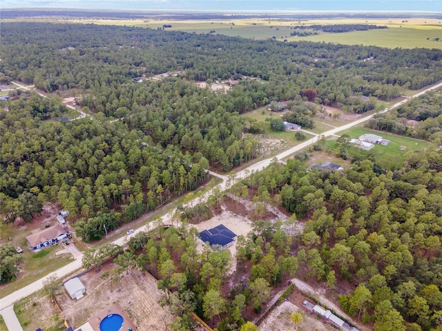 bird's eye view with a forest view