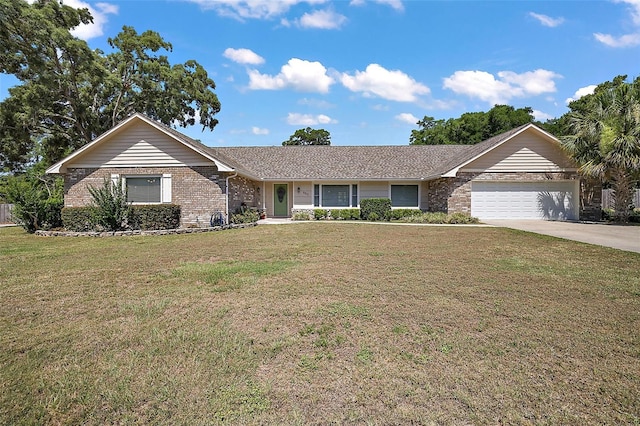 ranch-style home featuring a garage and a front yard