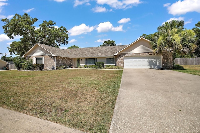 single story home with a garage and a front yard