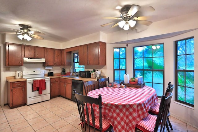 18001 SE Hawthorne Rd, Hawthorne, FL 32640 - kitchen with a ceiling fan, a sink, black appliances, under cabinet range hood, and light tile patterned flooring