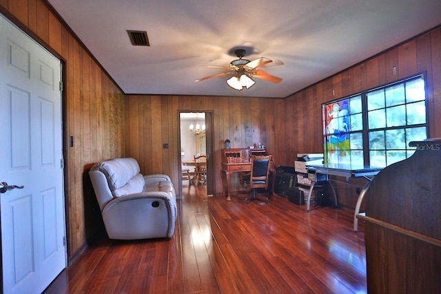 18001 SE Hawthorne Rd, Hawthorne, FL 32640 - office space featuring dark wood-style flooring, wood walls, ceiling fan with notable chandelier, and visible vents