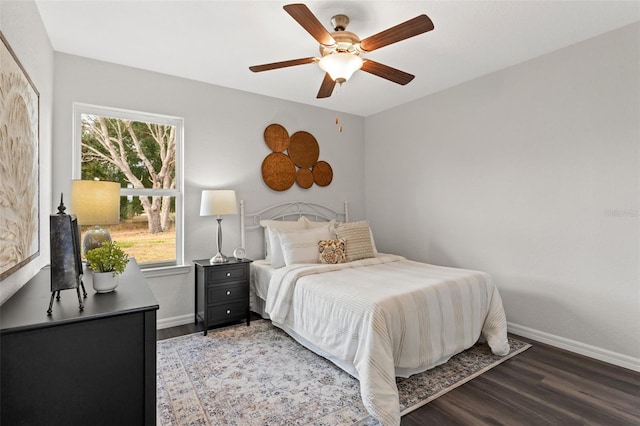 bedroom featuring wood-type flooring and ceiling fan