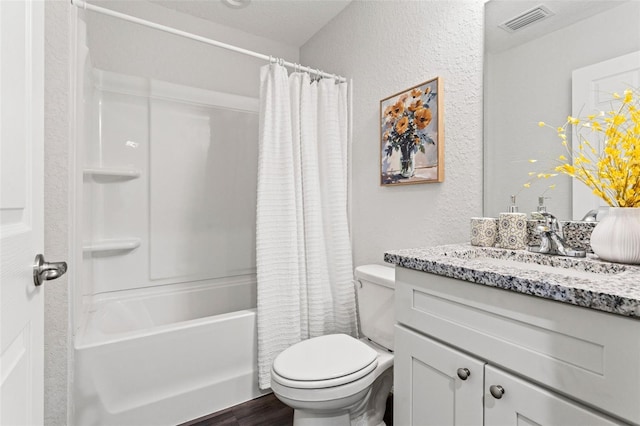 full bathroom featuring shower / bath combo with shower curtain, toilet, vanity, and hardwood / wood-style flooring