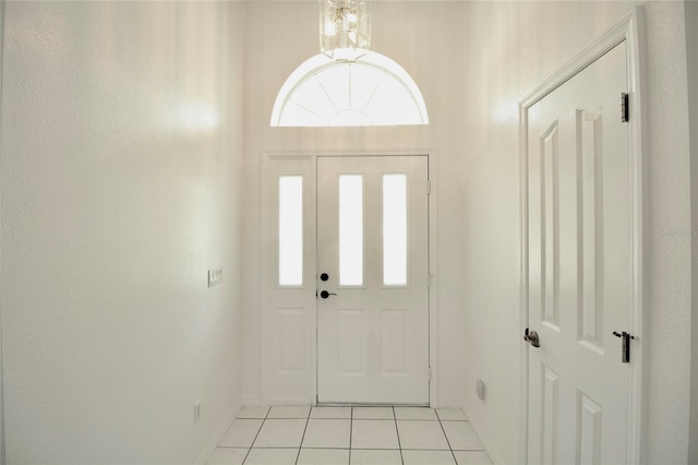 foyer with light tile floors