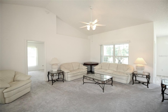 living room featuring high vaulted ceiling, ceiling fan, and carpet floors